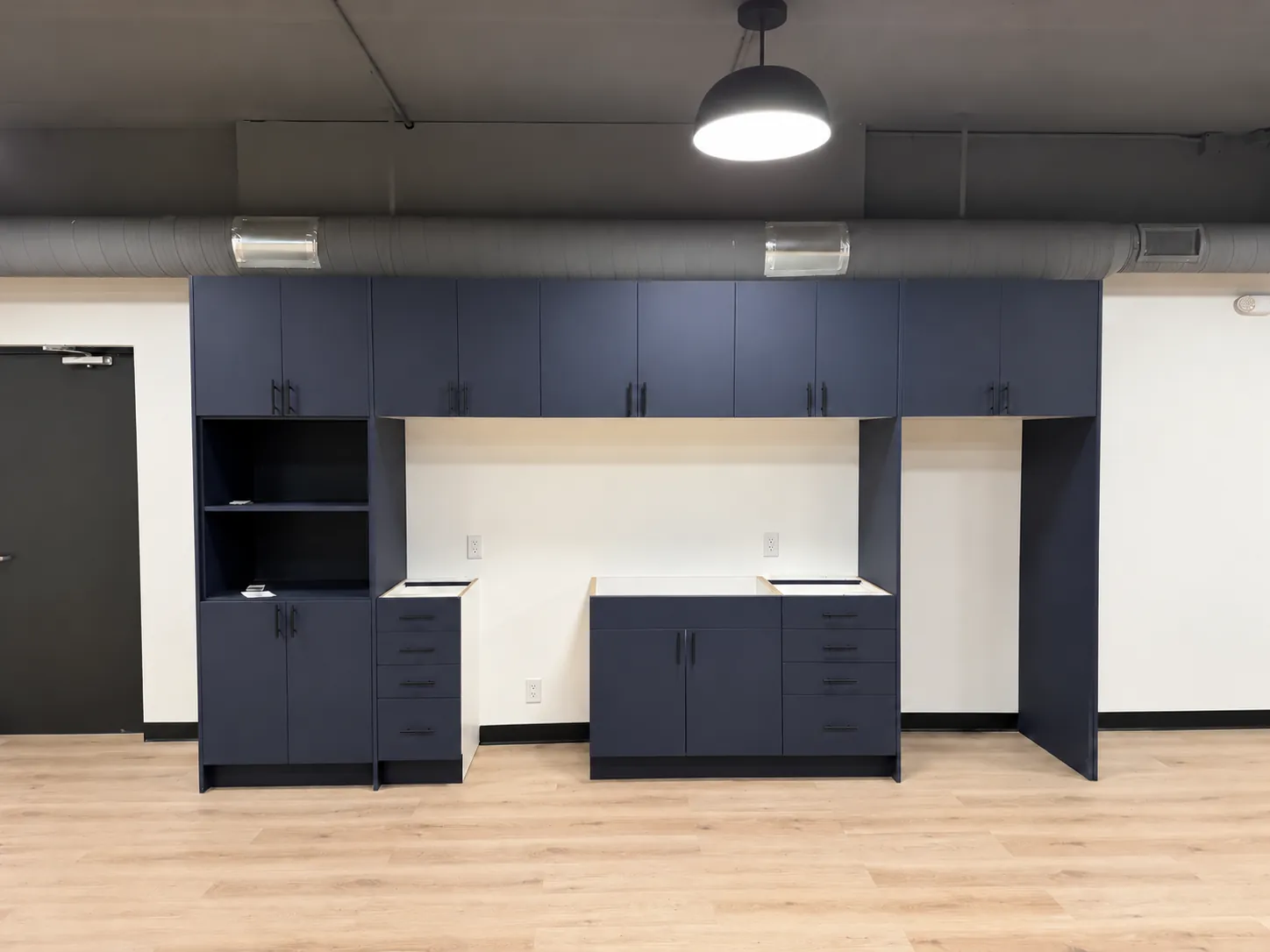 Built-in cabinetry in an open-plan workspace